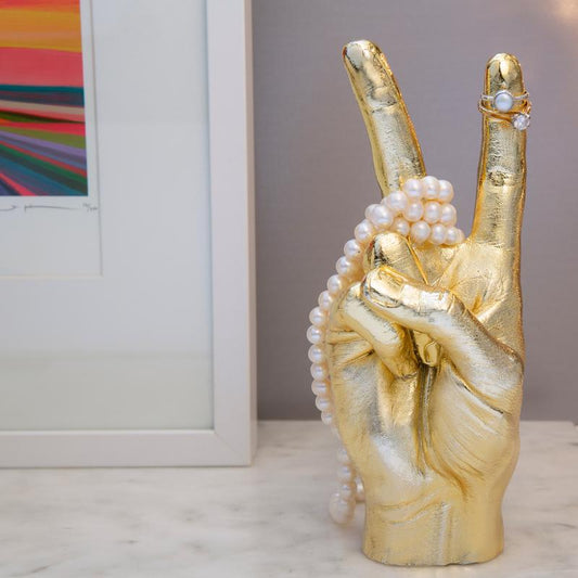 Gold Peace Sign Sculpture
